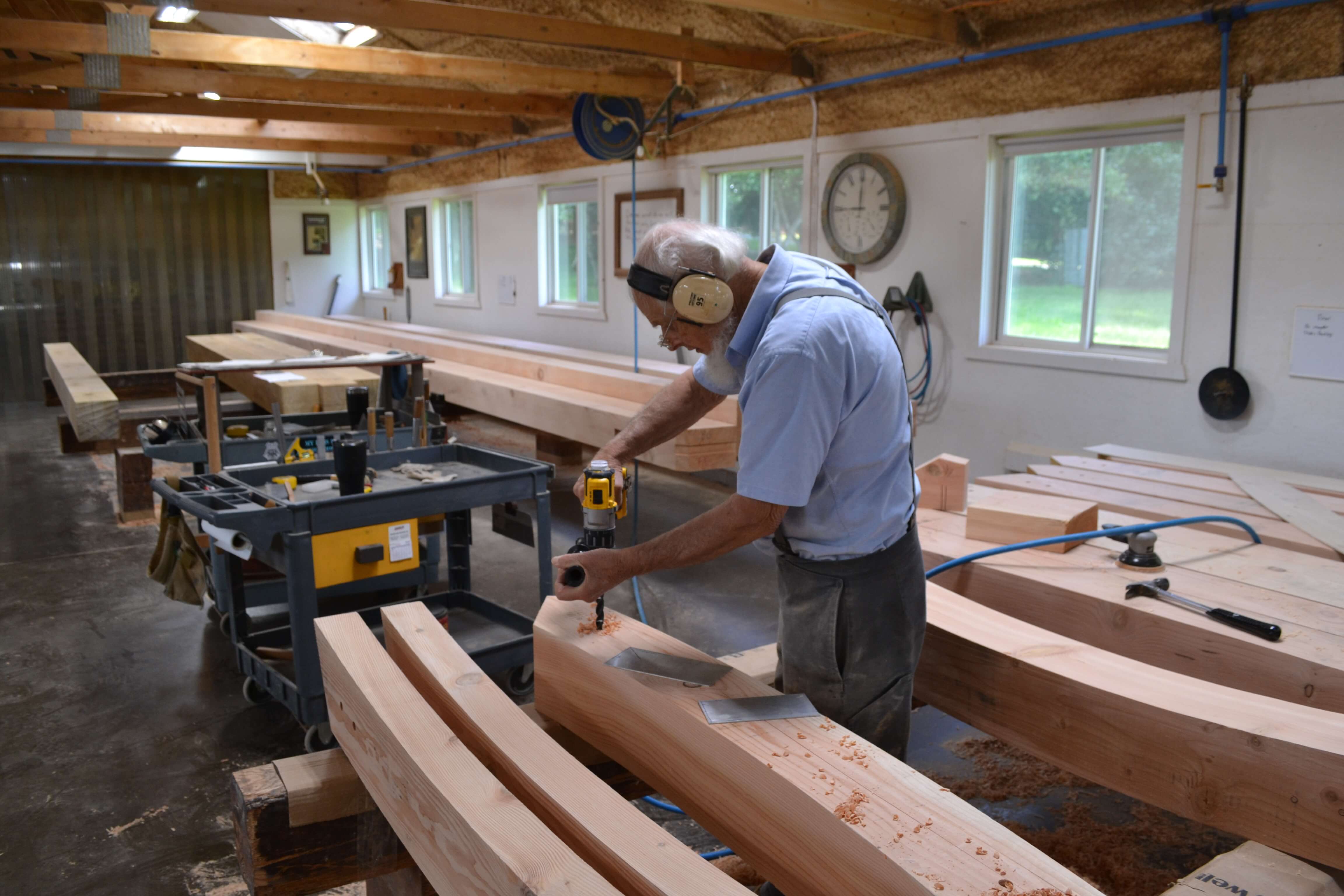 Amish craftsman build beams for the entrance to Fixari Family Dental of Lewis Center